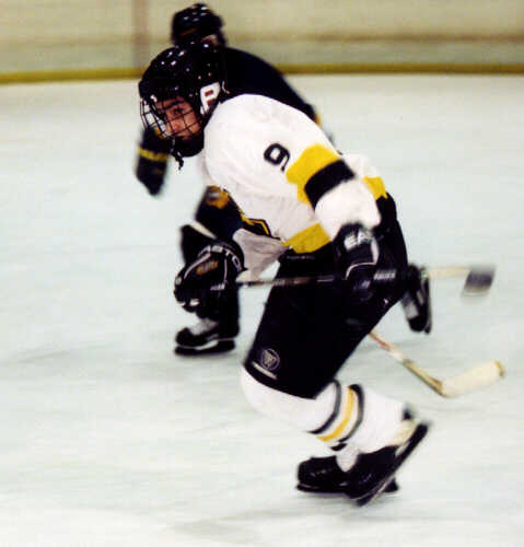 Lee Allen breezes past a St. Ignatius Wildcat.