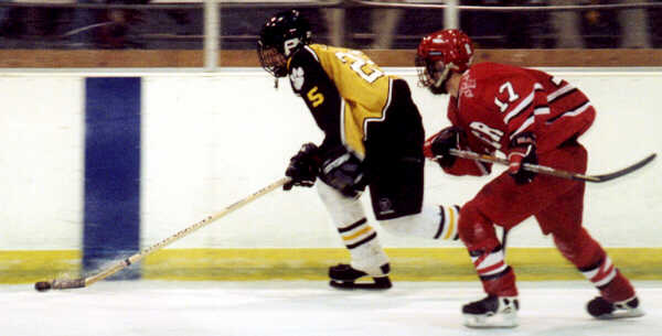 Lee Allen carries the puck down the wing.