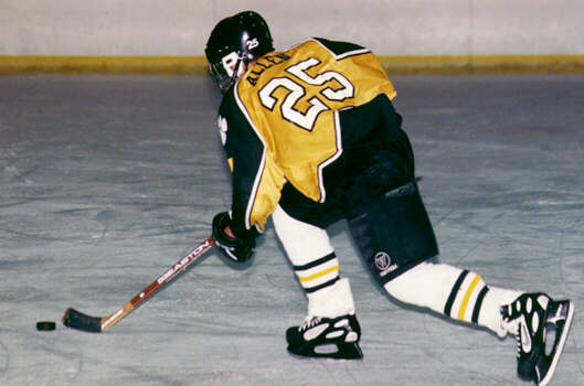 Lee Allen advances the puck.