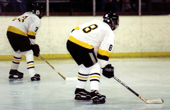 Jared Lavender and Kyle Barden line up for a faceoff.