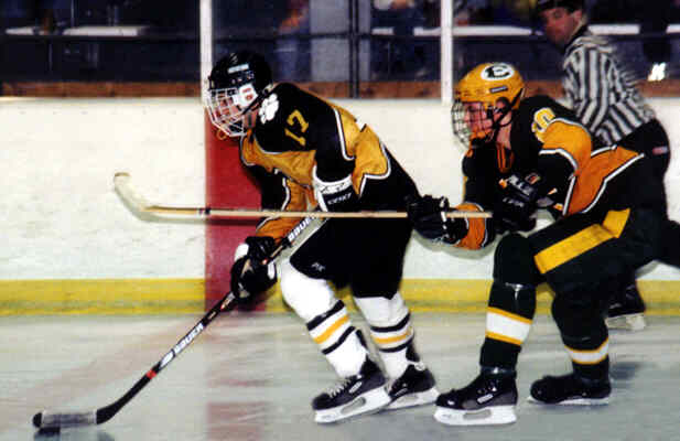 Brendon Benner gets by a hooking St. Edward Eagle.