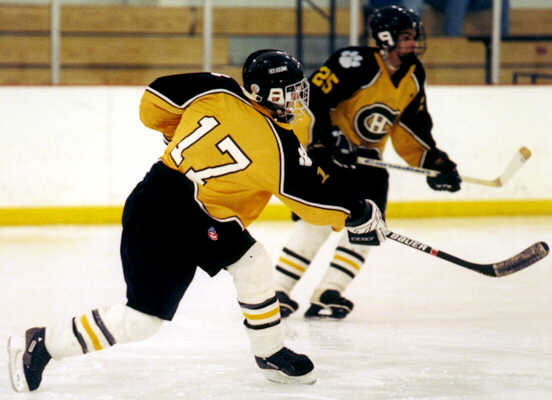 Brendon Benner shoots against Rocky River.