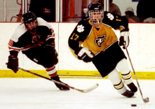 Brendon Benner skates past a forechecker.