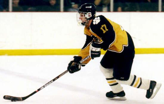 Brendon Benner advances the puck.
