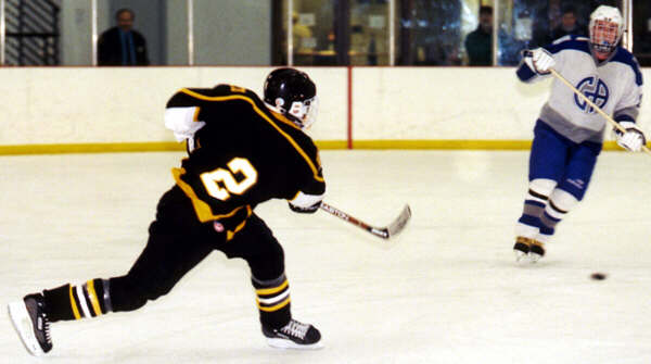 Brendon Benner shoots against Gilmour.
