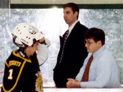Ben Gaglioti confers with Coach Steve Bogas.