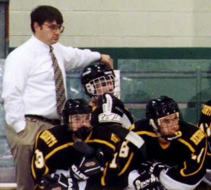 Coach Steve Bogas watches the Tigers.