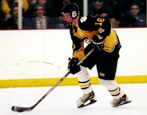 Milton Carter moves the puck.