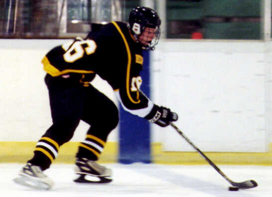 Milton Carter brings the puck into Padua territory.