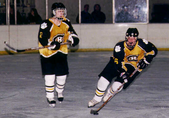 Milton Carter takes the handoff from Brendon Benner.