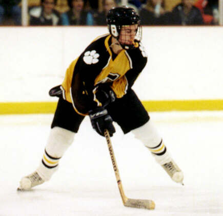 Pat Collins holds the puck against Rocky River.