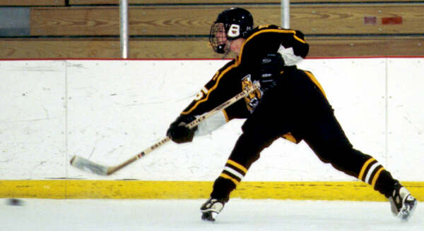 Pat Collins fires a shot.