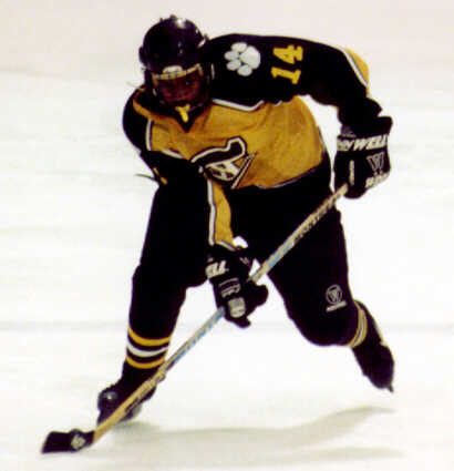 Marcus Dancy breaks out with the puck.