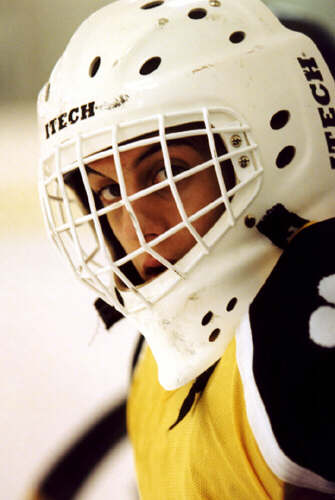 Ben Gaglioti watches from the bench.