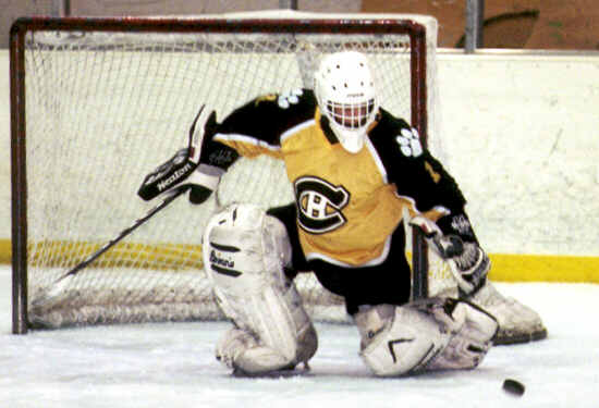 Ben Gaglioti protects the net.