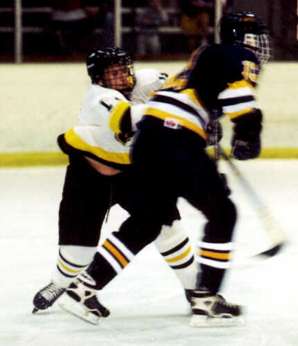 Jeremy Holmes careens into a St. Ignatius Wildcat.