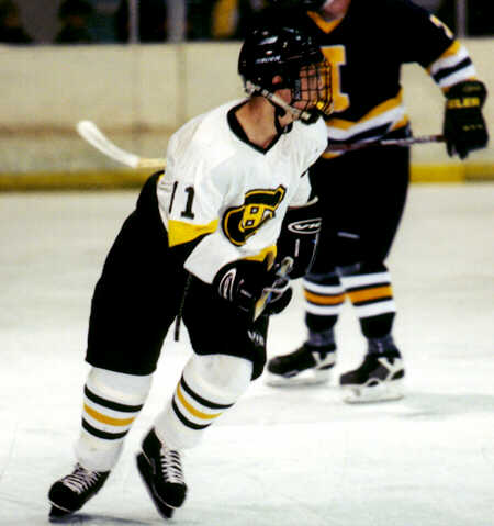 Jeremy Holmes keeps an eye on the puck.