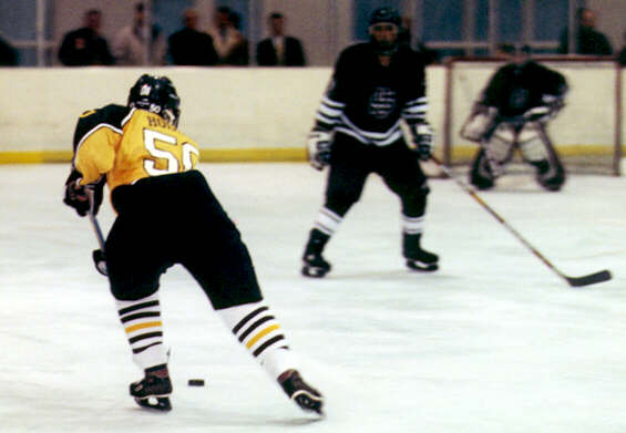 Jeremy Holmes moves into University's zone.