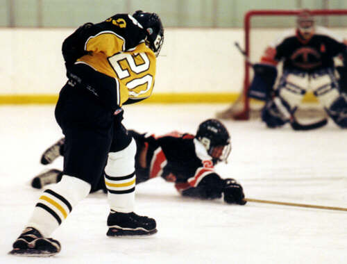 Justin Kalman unloads a slapshot from the point.