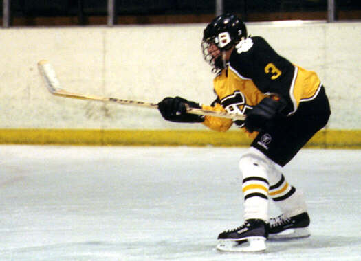 Jared Lavender shoots against University.