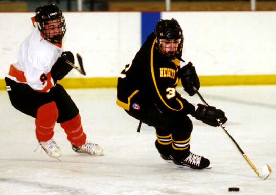 Jared Lavender is pursued by a Bethel Park Blackhawk.
