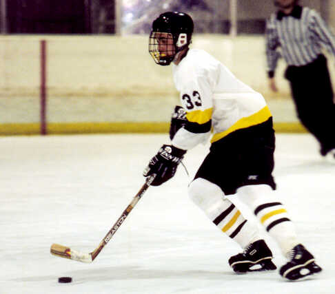 Mike Ruflin maneuvers through the Tigers' zone.