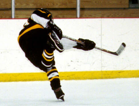 Mike Ruflin lets loose a shot.