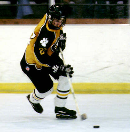 Andrew West cuts toward the University goal.