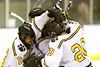Ian Kraus is mobbed by teammates after his game-tying goal.