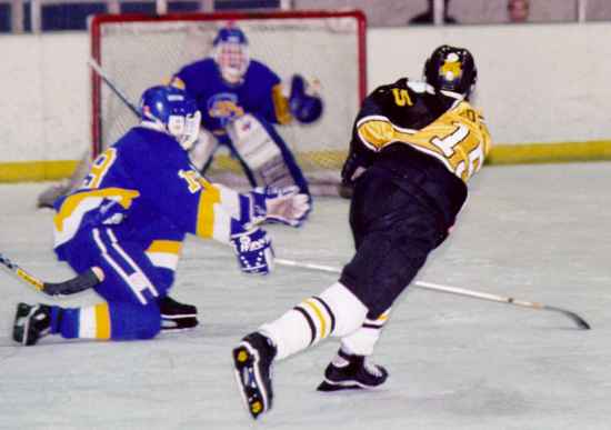 Sean Collins fires a shot on goal