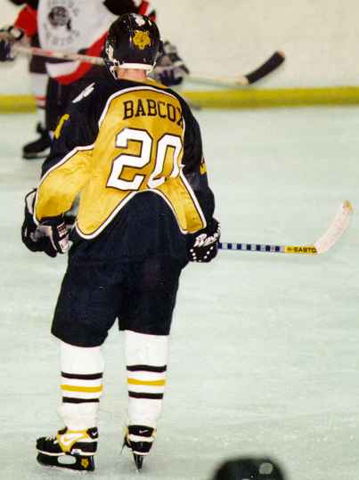 Eddie Babcox waits for a faceoff against Padua