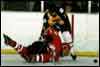 Jeff Hindulak hogties a Shaker defenseman.