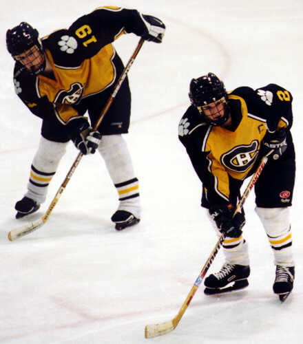 Jeff Hindulak and Eric Aber set themselves for a faceoff.