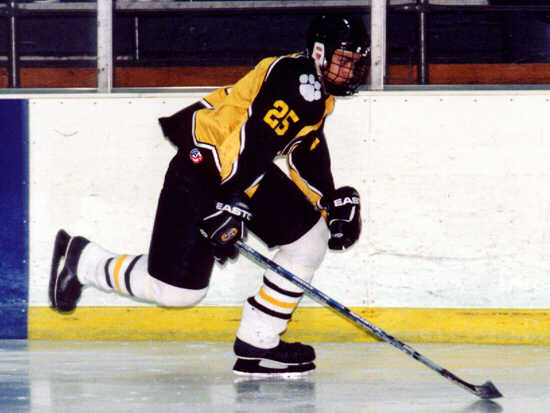 Lee Allen races down the left wing.