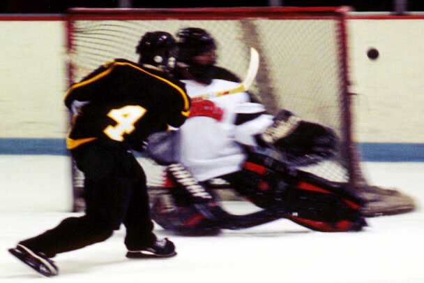 Brian Clark fires point blank from the Kent slot.