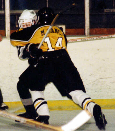 Marcus Dancy collides with a Lake Catholic Cougar.