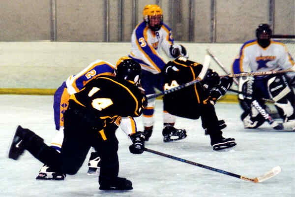 Marcus Dancy and Brian Clark create a scoring opportunity against Lakewood.