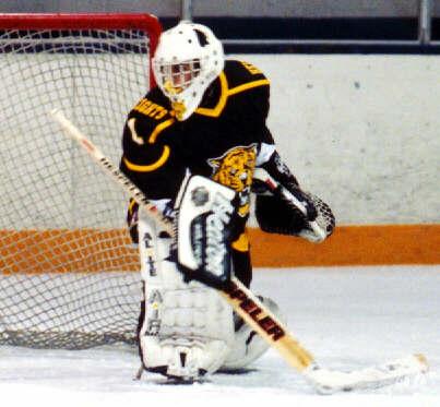 Ben Gaglioti watches a North Olmsted shot sail wide.