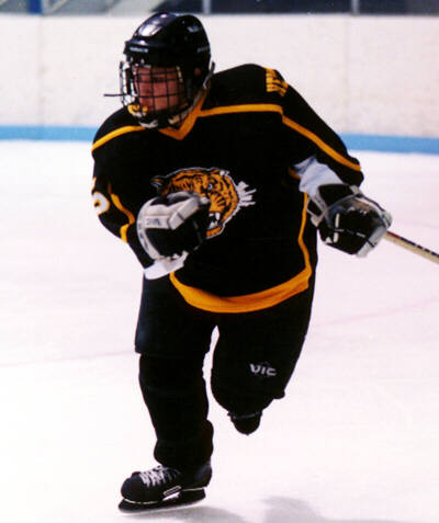 Jeremy Holmes zeroes in on the puck.