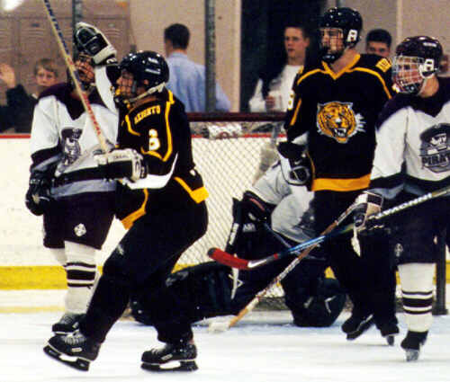 Jeremy Holmes celebrates Lee Allen's goal against Rocky River.