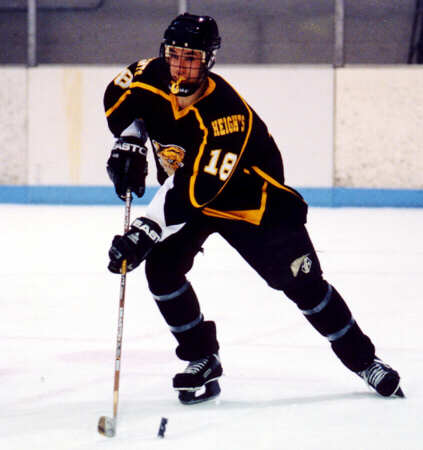Mike Ruflin corrals a rolling puck.