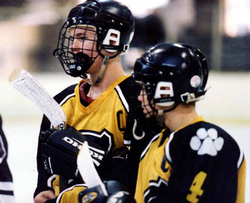 Sean Clark and Brian Clark line up against University.