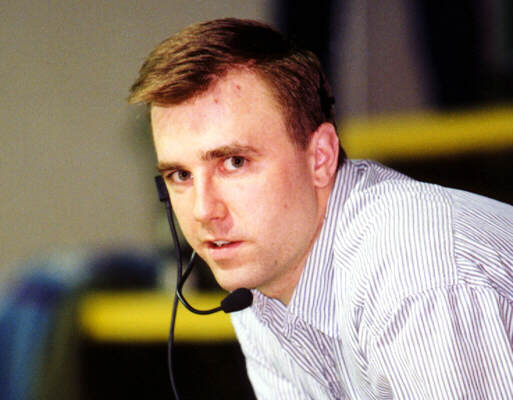 Pete Shriver keeps an eye on the action from the stands.