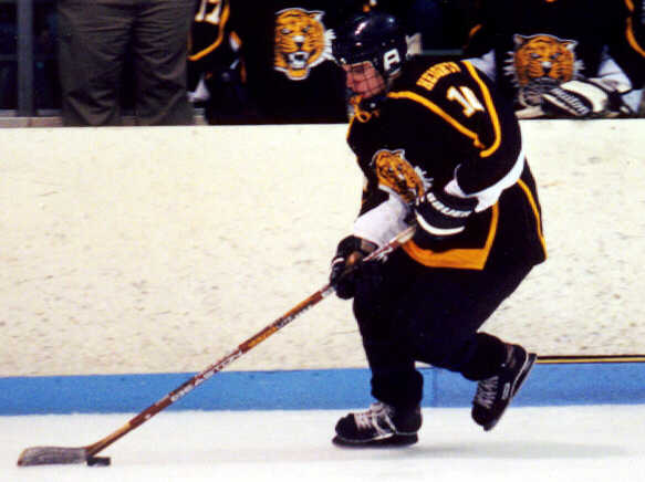 Doug Turner cruises past the Tigers' bench.
